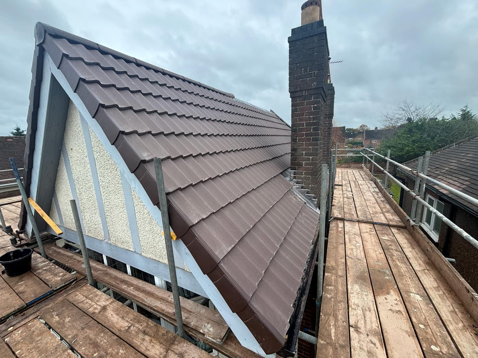 New Roof Installation in Greenhill Coalville Using a Sandtoft Double Pantile — roofing work by Armour Shield Roofing Services Coalville (photo 5)