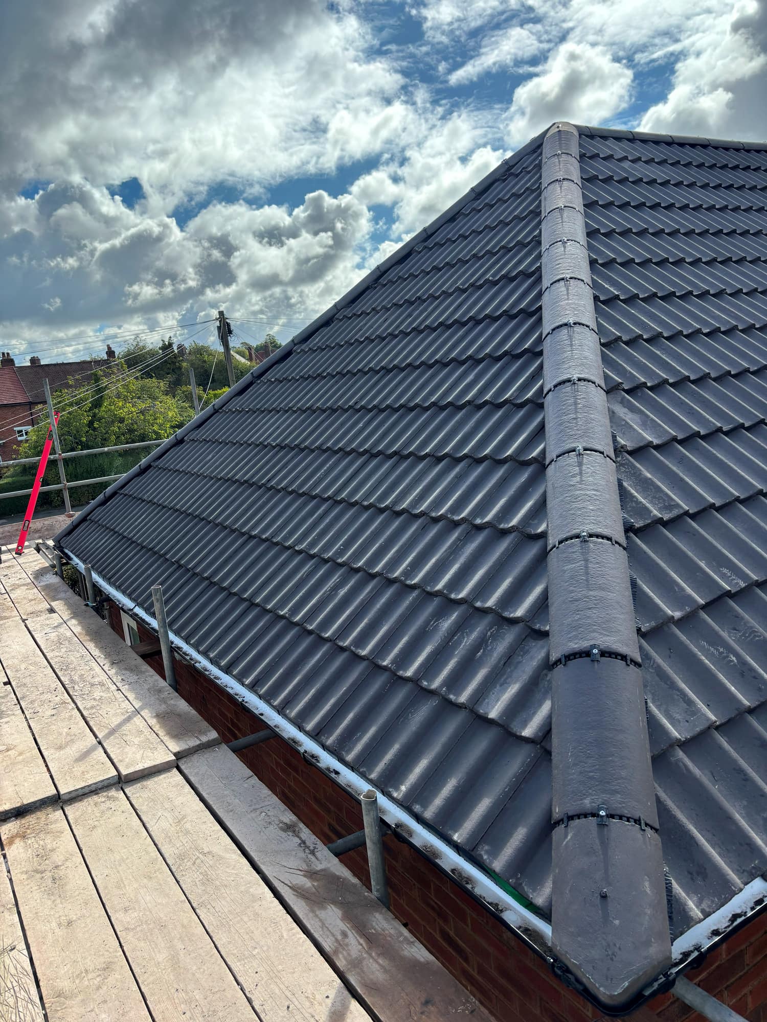 New Roof in Ashby de la Zouch with a Sandtoft Charcoal Double Pantile — roofing work by Armour Shield Roofing Services Coalville (photo 39)
