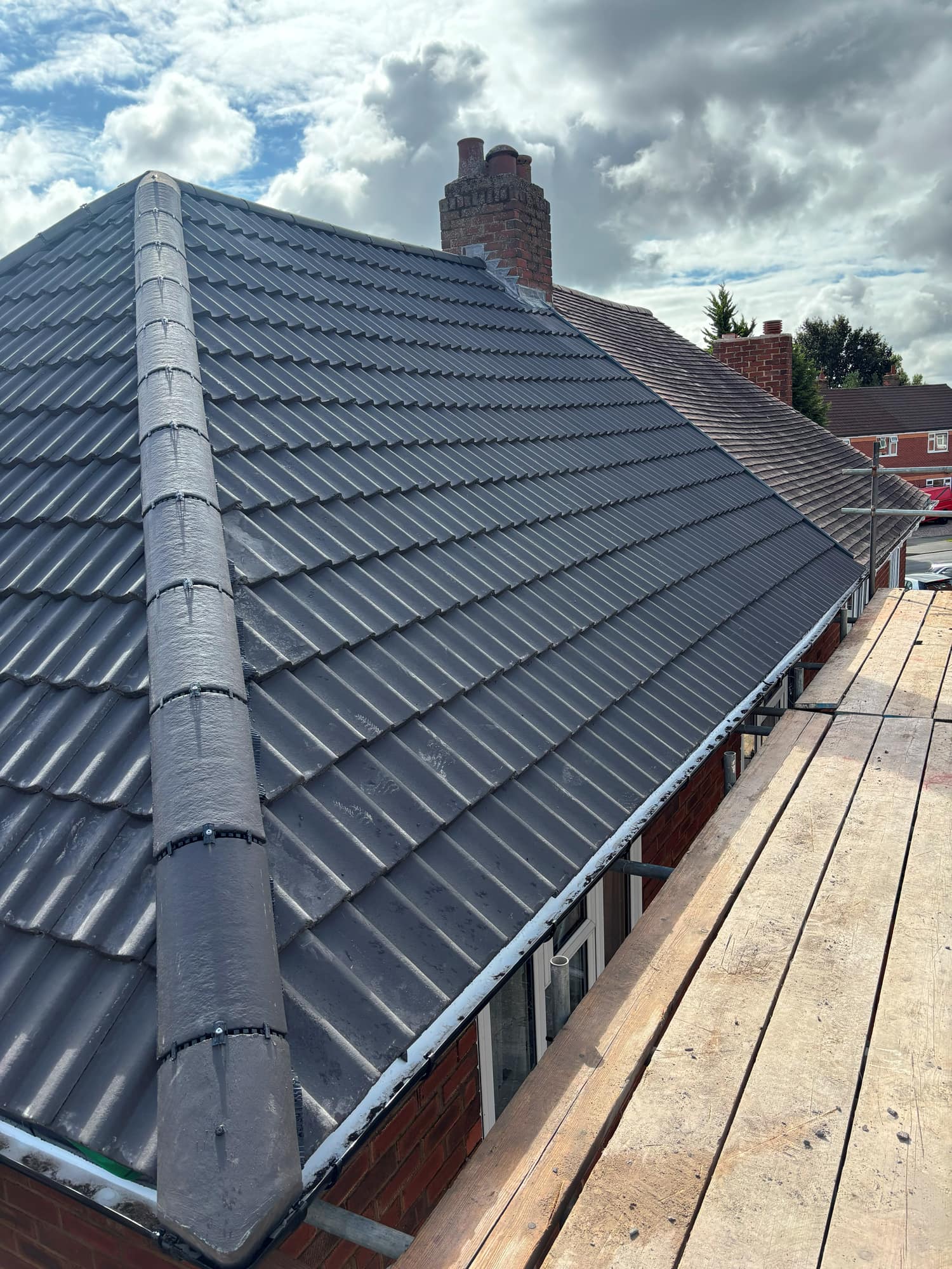 New Roof in Ashby de la Zouch with a Sandtoft Charcoal Double Pantile — roofing work by Armour Shield Roofing Services Coalville (photo 44)