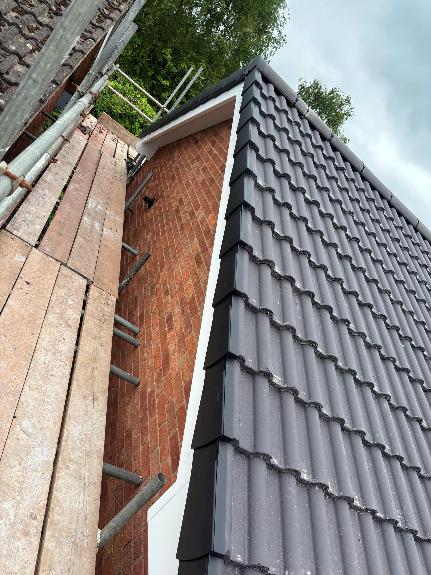 New Roof in Thringstone Using Double Roman Tiles — roofing work by Armour Shield Roofing Services Coalville (photo 63)