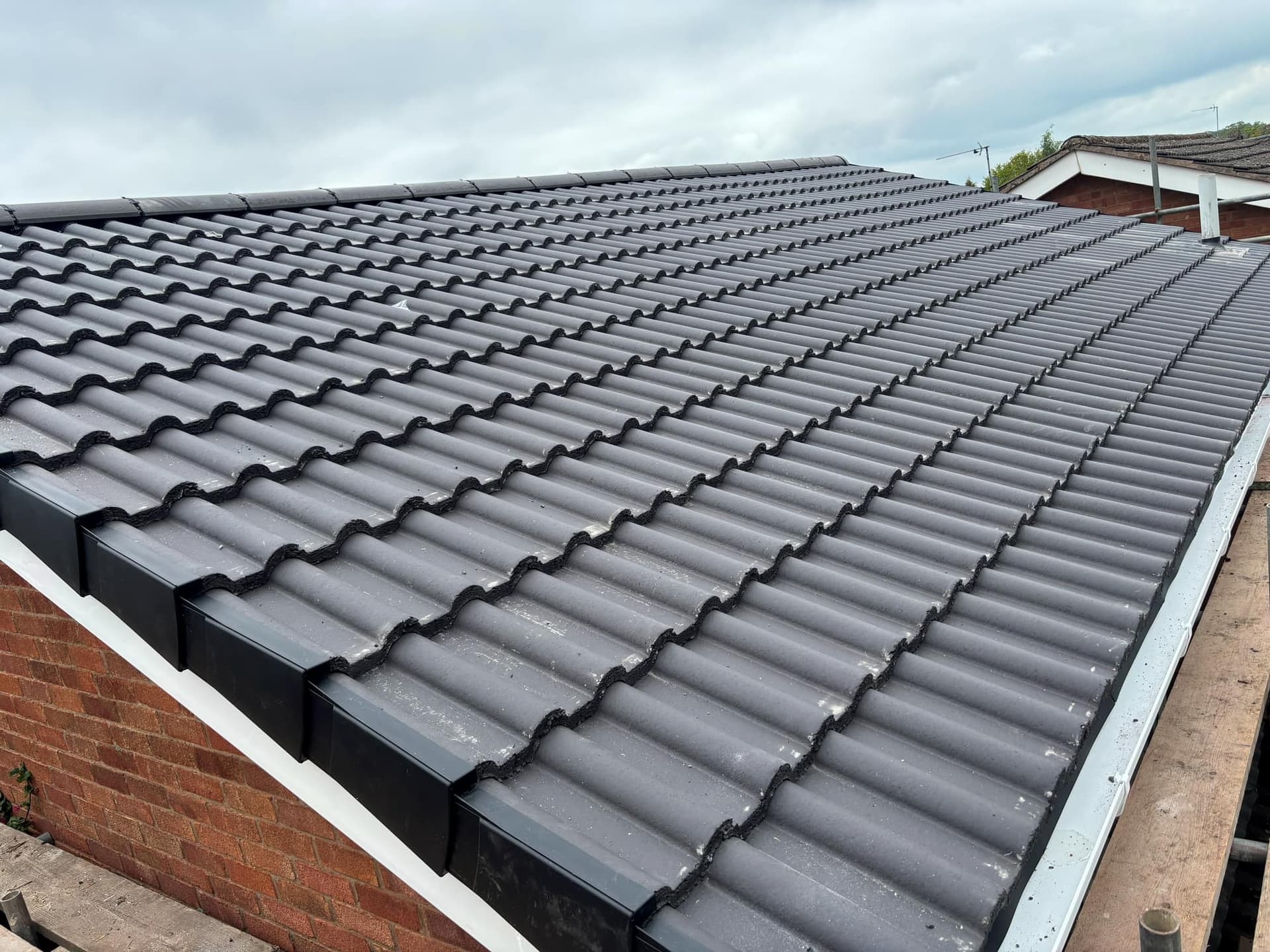 New Roof in Thringstone Using Double Roman Tiles — roofing work by Armour Shield Roofing Services Coalville (photo 62)
