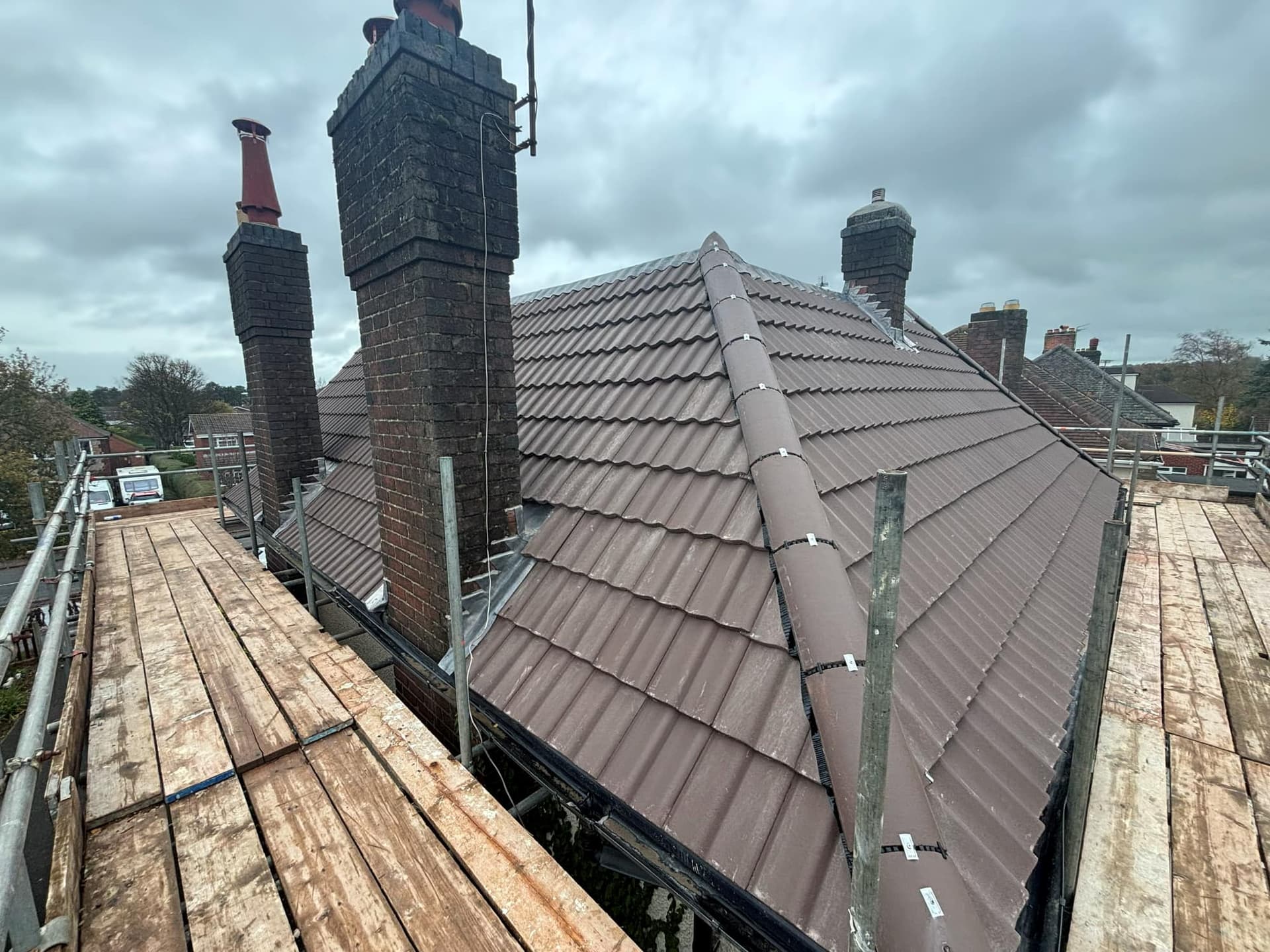 New Roof Installation in Greenhill Coalville Using a Sandtoft Double Pantile — roofing work by Armour Shield Roofing Services Coalville (photo 25)