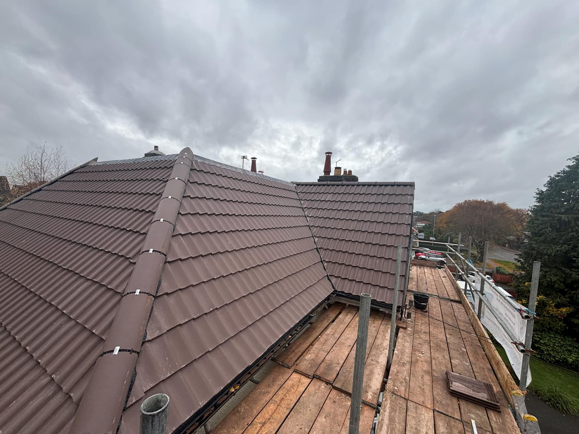 New Roof Installation in Greenhill Coalville Using a Sandtoft Double Pantile — roofing work by Armour Shield Roofing Services Coalville (photo 43)