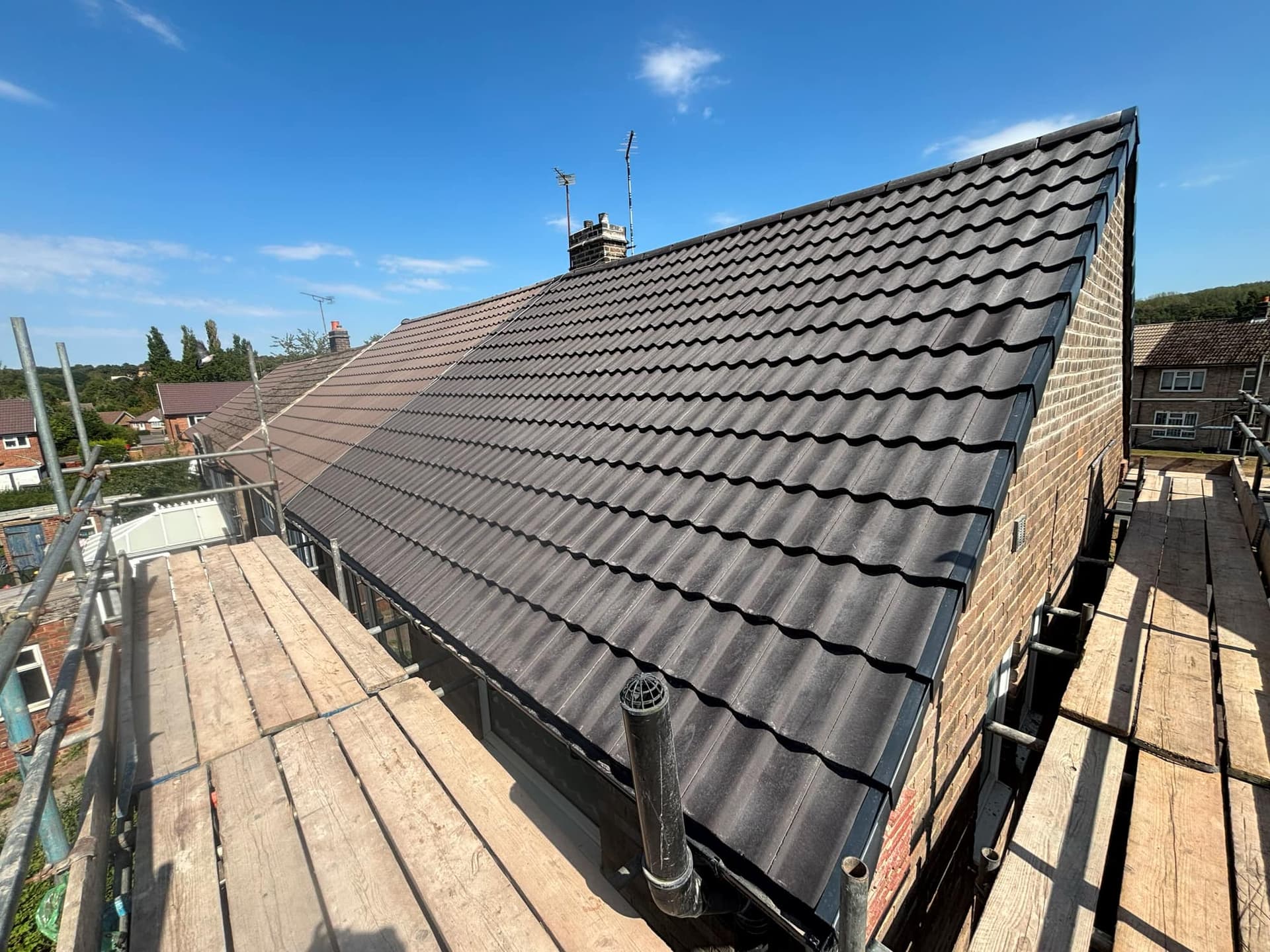 New roof at Greenhill, Coalville, in Sandtoft charcoal double pantiles